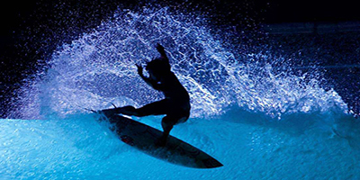 picture of surfer at night